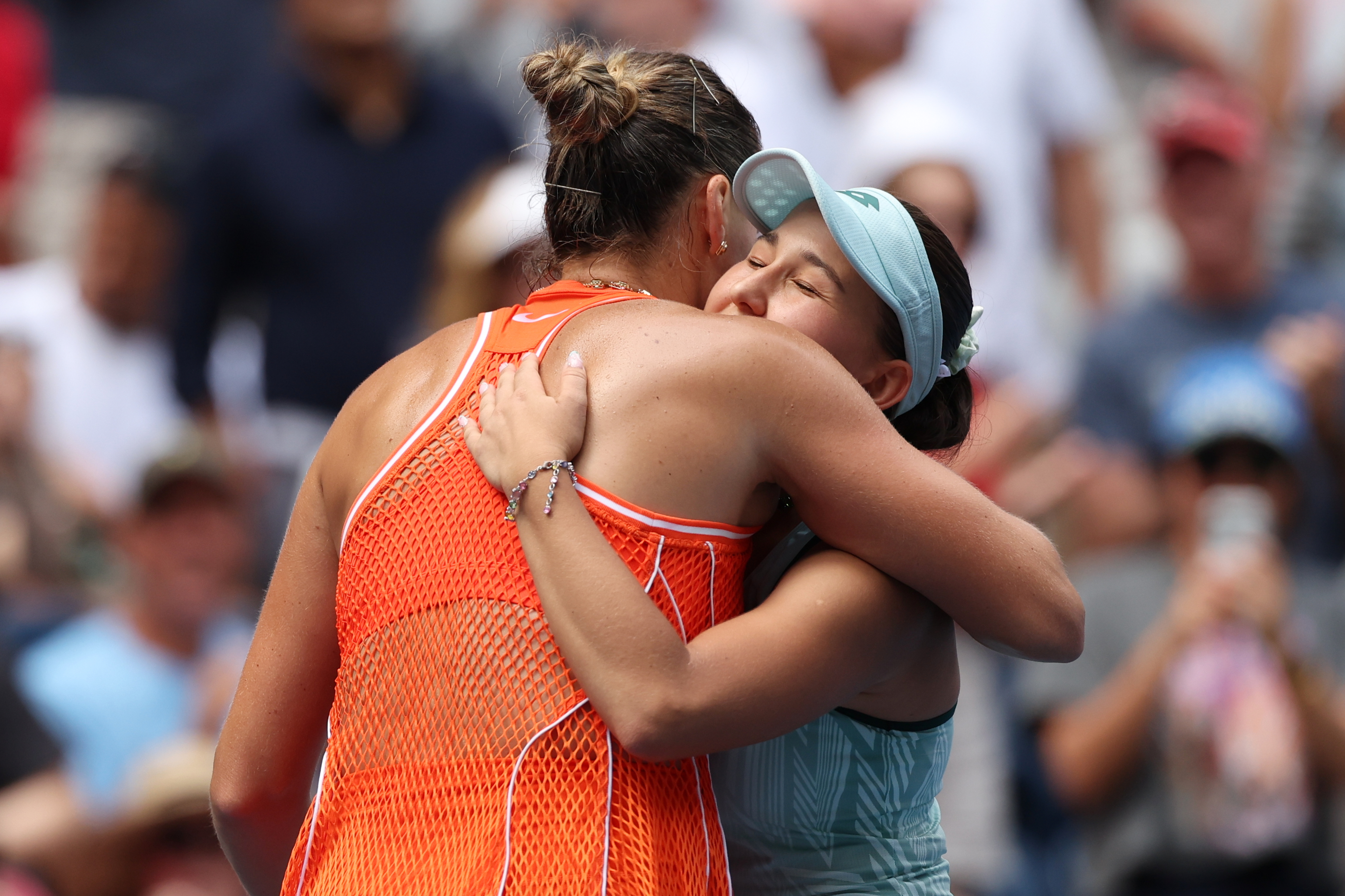 Sabalenka gets through tough test at the US Open, with Williams sisters in doubles action at night