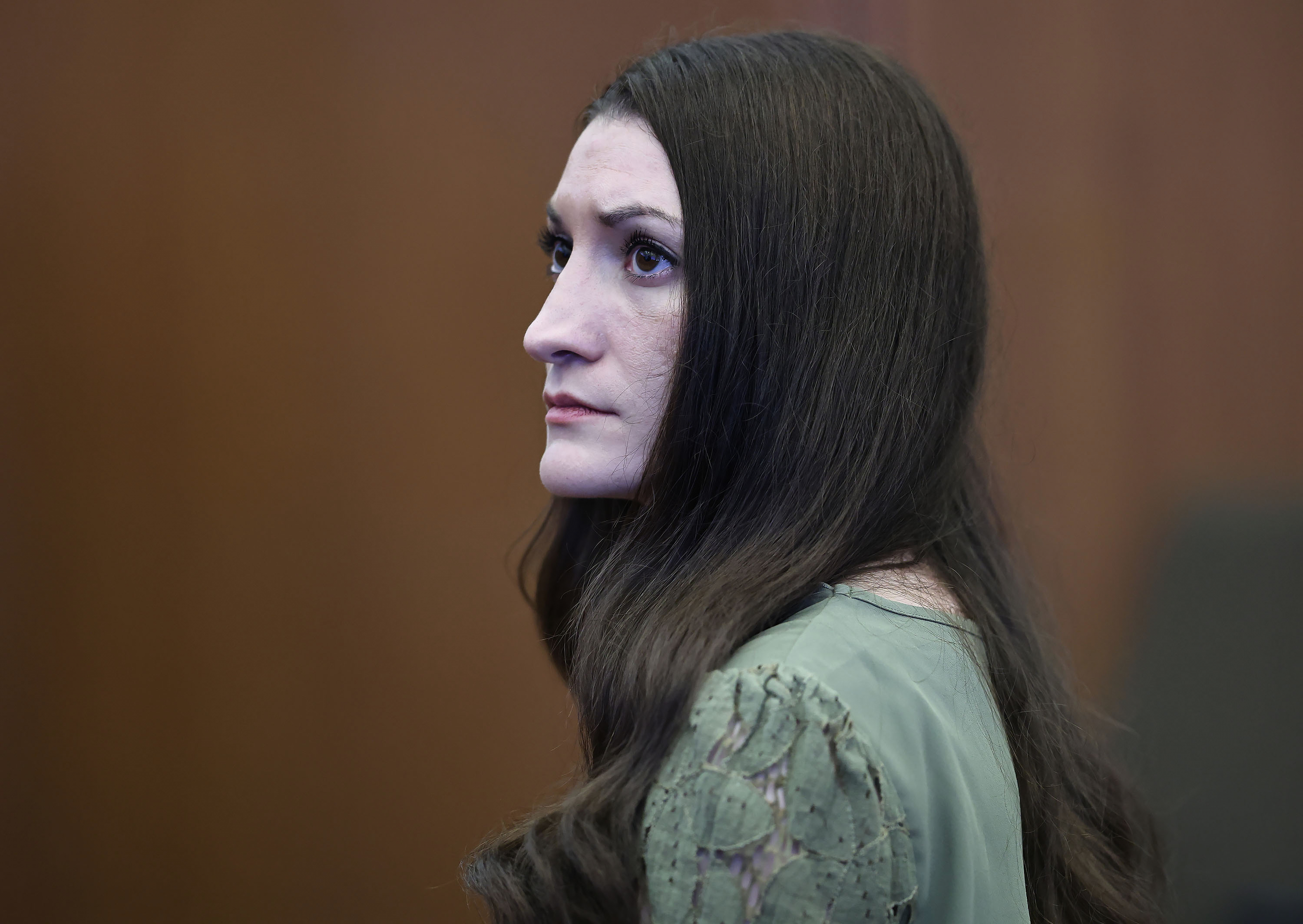 Defendant Lindsay Clancy looks at the jury after Judge William Sullivan declared a mistrial in Clancy's murder trial on Friday, in Plymouth, Mass. Clancy would've faced life in prison without the possibility of parole if she was convicted.
