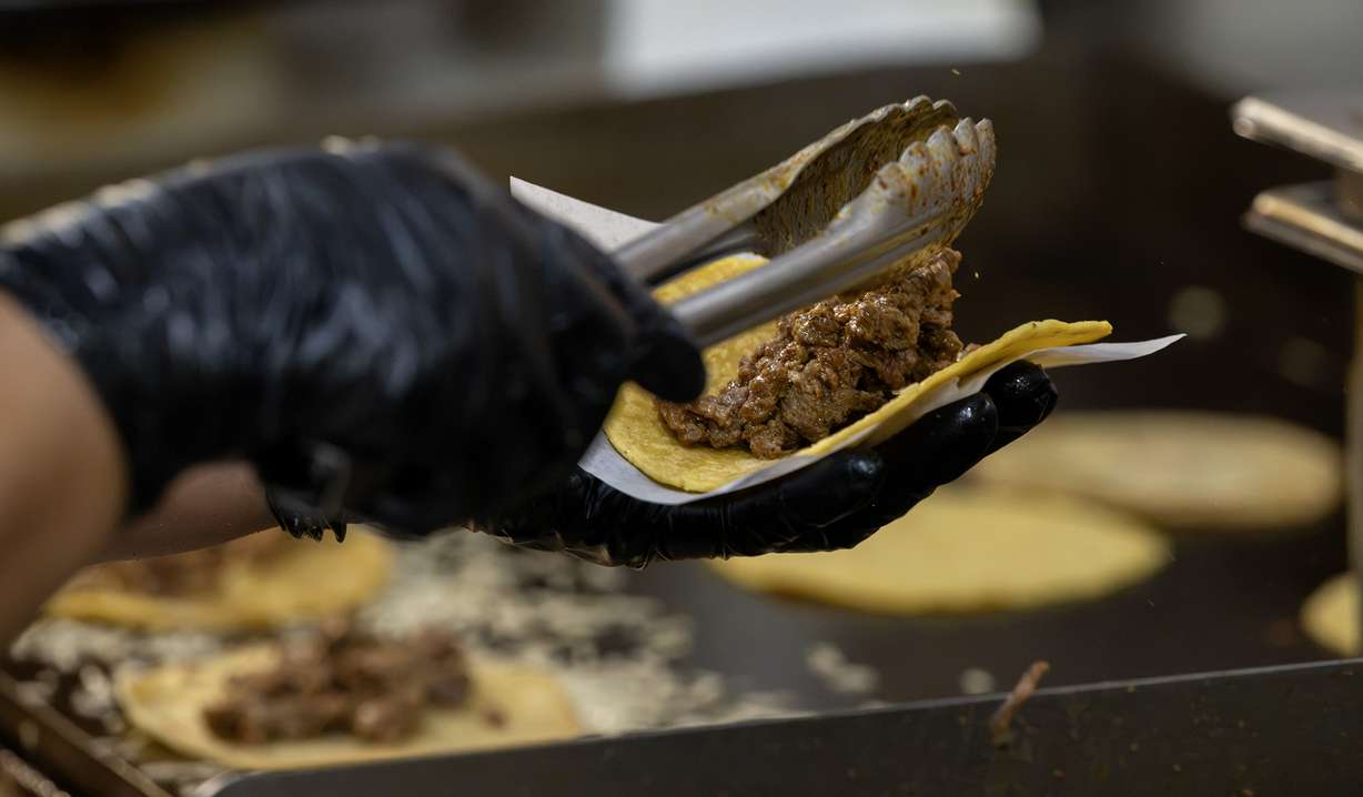 Kitchen staff prepares an order at ROCTACO in Salt Lake City on Friday. Five years after opening, Salt Lake City restaurant ROCTACO is looking to expand — if the fit is right.