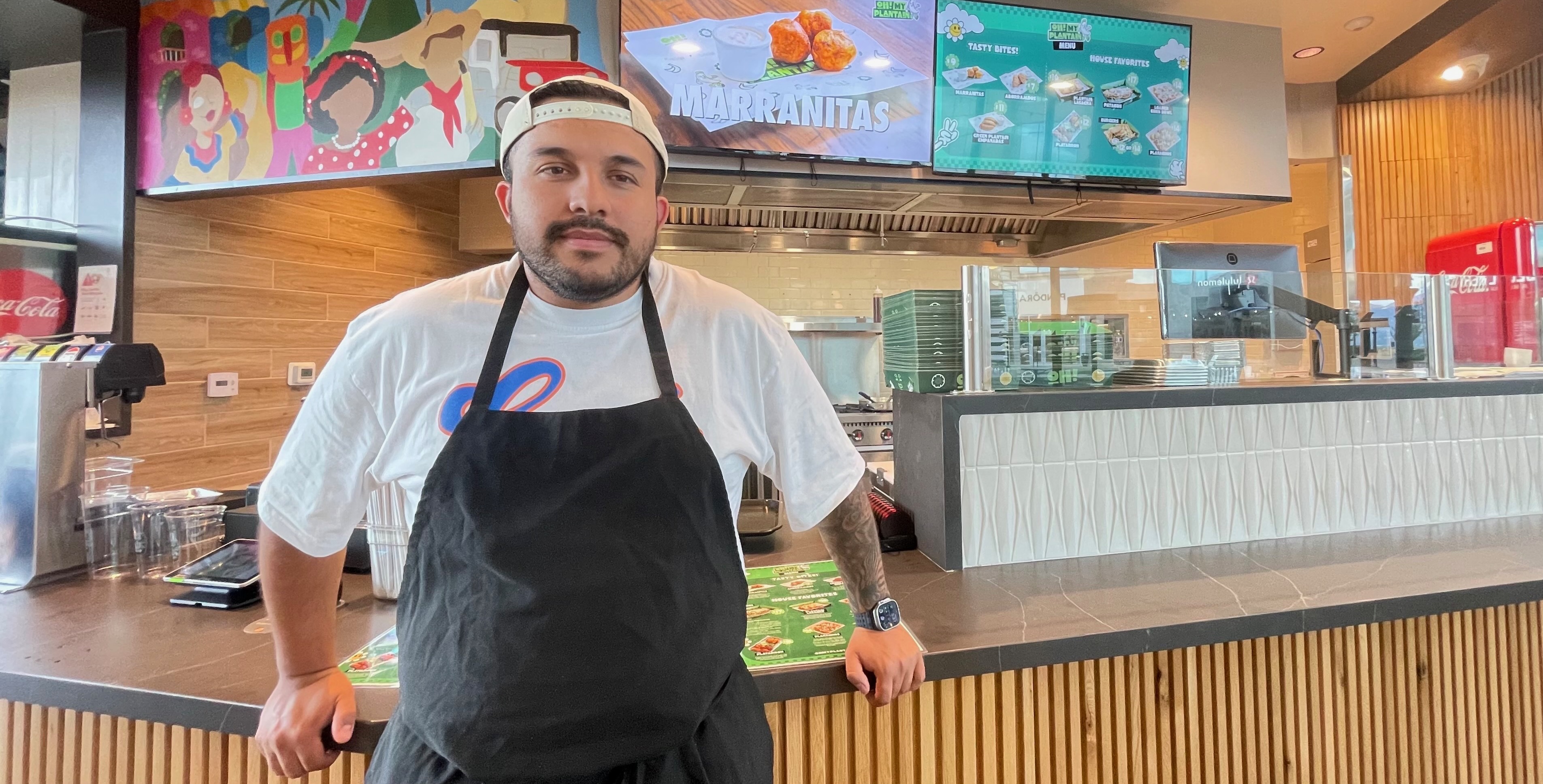 Colombian restaurant operator Steven Rodriguez puts the focus on plantains, a staple in Colombia, on the menus of two locales he operates. The photo shows him at the restaurant's Riverton location on Aug. 26.