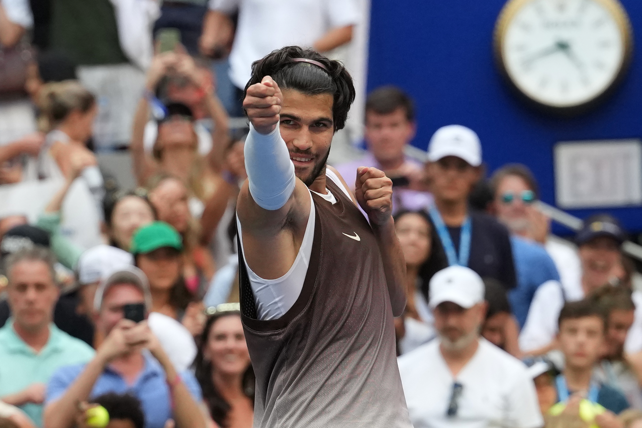 Carlos Alcaraz, of Spain, gestures after he won his match against Wu Yibing, of China, during the third round of the U.S. Open tennis championships Friday, Sept. 4, 2026, in New York. 