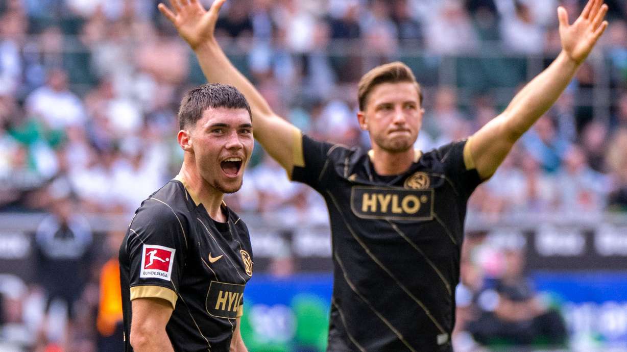 Elversberg's Felix Keidel, left, celebrates scoring with teammate Lukas Petkov during the Bundesliga soccer match between Borussia Mönchengladbach and SV Elversberg in Mönchengladbach, Germany, Saturday Sept. 5, 2026.