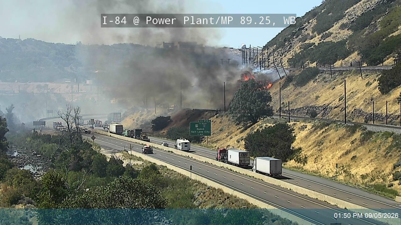 A grass fire at the mouth of Weber Canyon in Weber closed I-84 on Saturday.