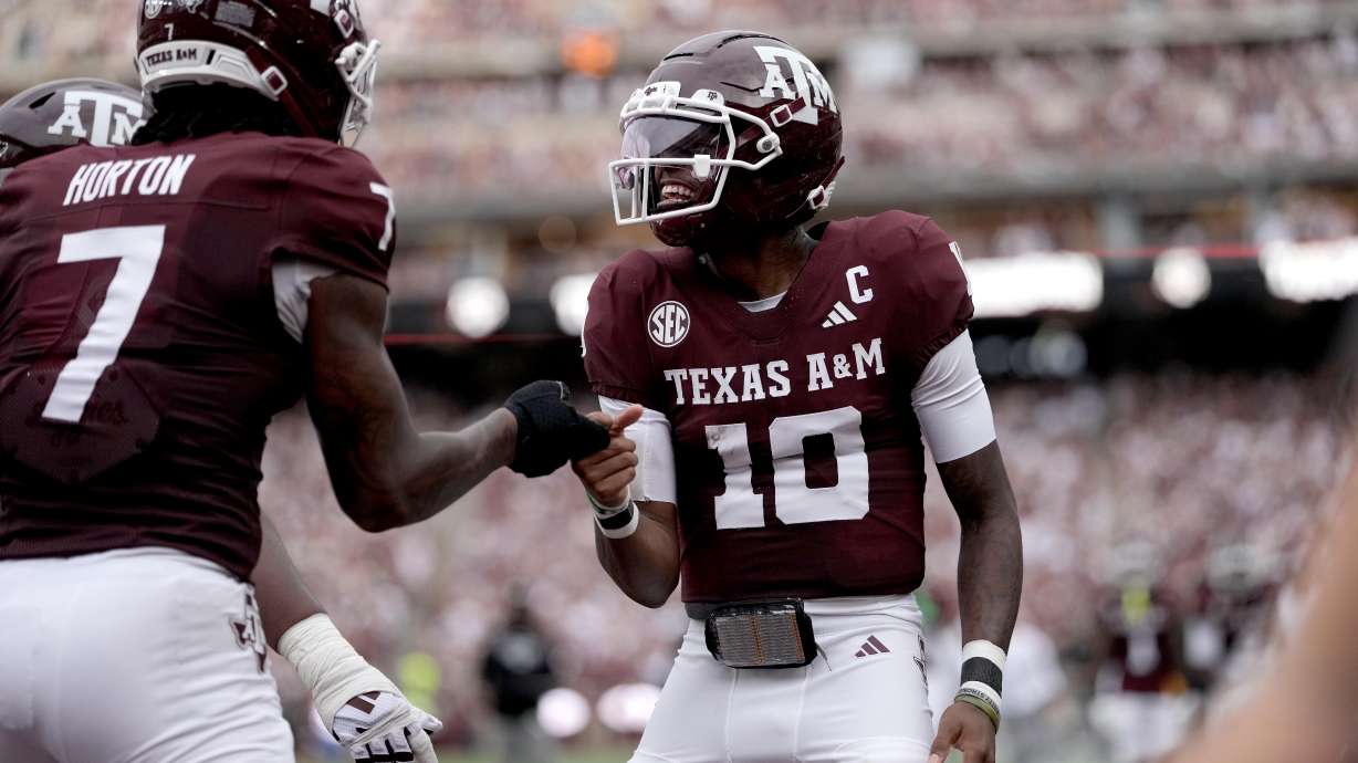 Texas A&M quarterback Marcel Reed (10) reacts with teammate Isaiah Horton (7) after a touchdown against Missouri State during the first quarter of an NCAA college football game Saturday, Sept. 5, 2026, in College Station, Texas.