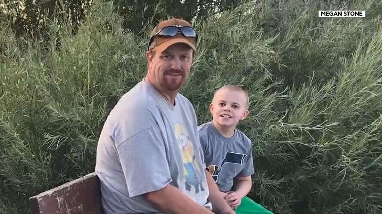 Jeff Stone with his son, Robbie Stone. The family is mourning his loss after the boat carrying four of his family members overturned and sank at Echo Reservoir.