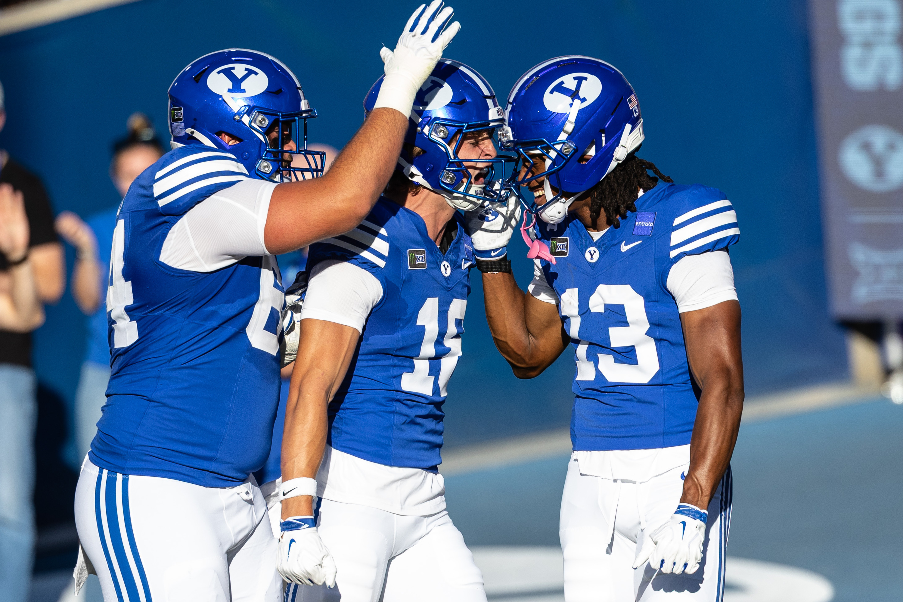 BYU Cougars wide receiver Jojo Phillips (13) celebrates with teammates after scoring a touchdown during a game against Utah Tech at LaVell Edwards Stadium in Provo on Saturday, Sept. 5, 2026.