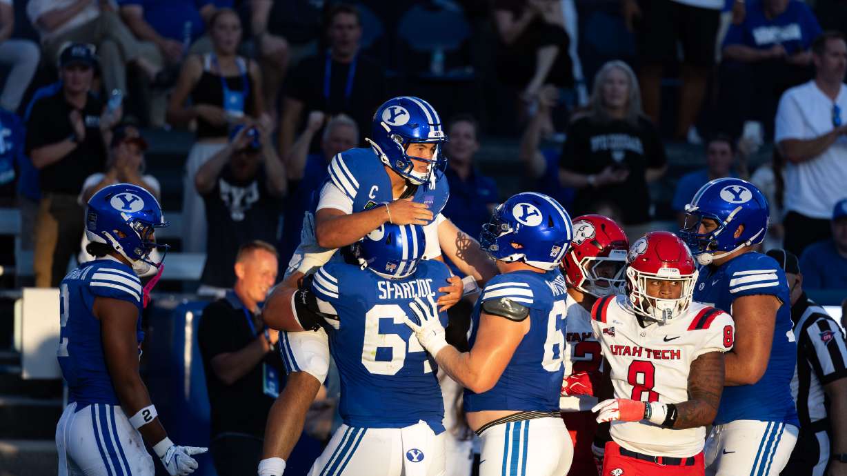 BYU Cougars quarterback Bear Bachmeier (47) is lifted into the air by his teammates during a game against Utah Tech at LaVell Edwards Stadium in Provo on Saturday, Sept. 5, 2026.