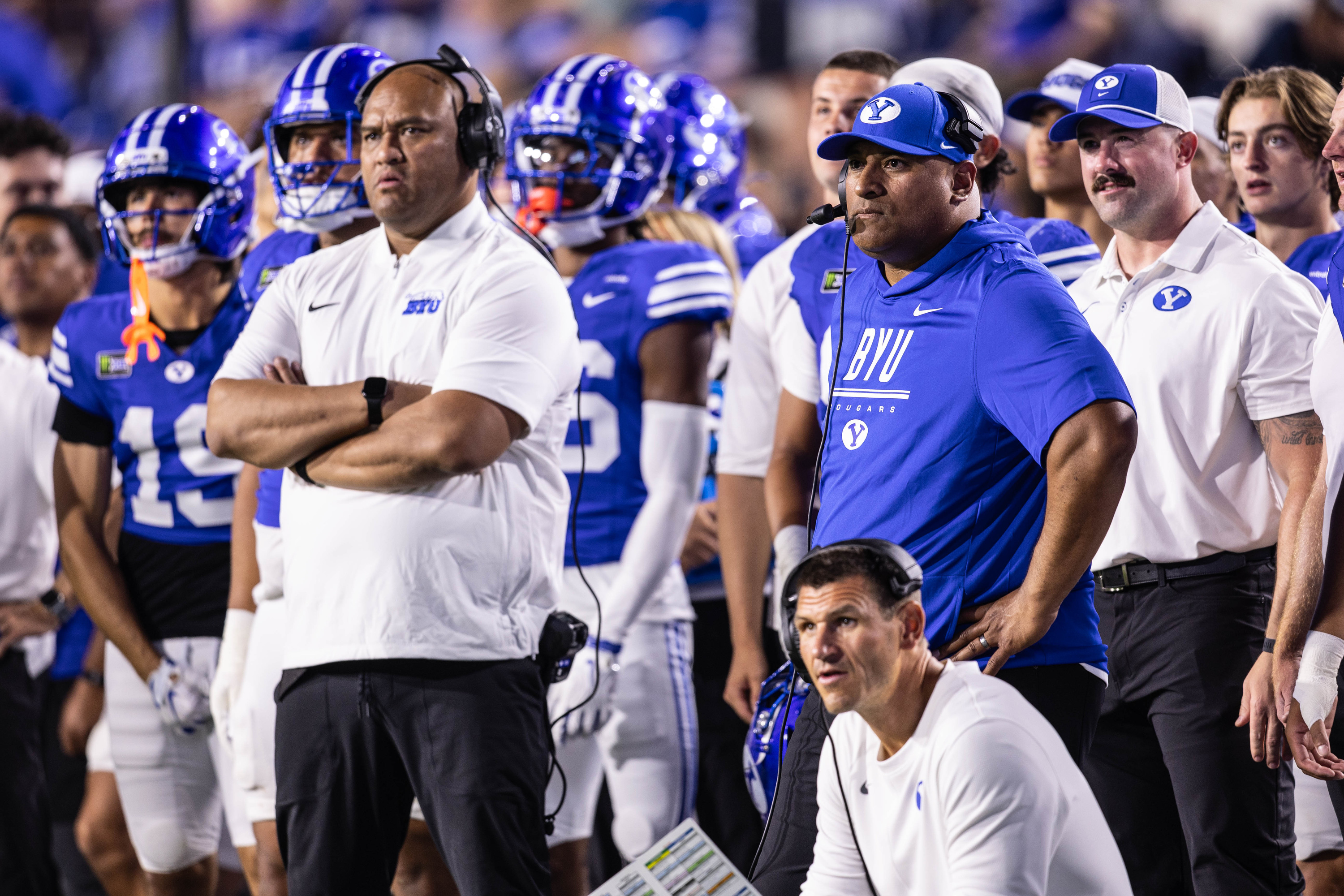 BYU Cougars head coach Kalani Sitake, right, watches his kicker kick a PAT during a game against Utah Tech at LaVell Edwards Stadium in Provo on Saturday, Sept. 5, 2026.