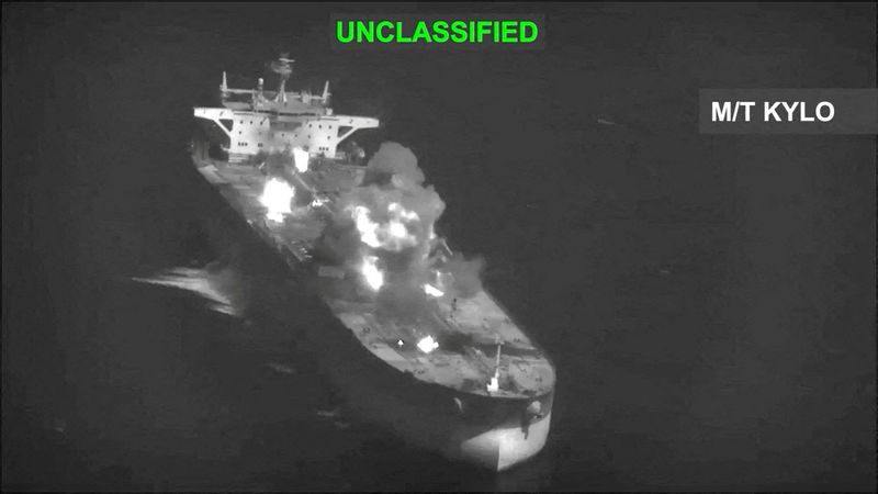 Fire and smoke rise during what U.S. Central Command says are strikes on Iranian oil carriers, at an unknown location in this screengrab taken from a handout video released on Saturday.
