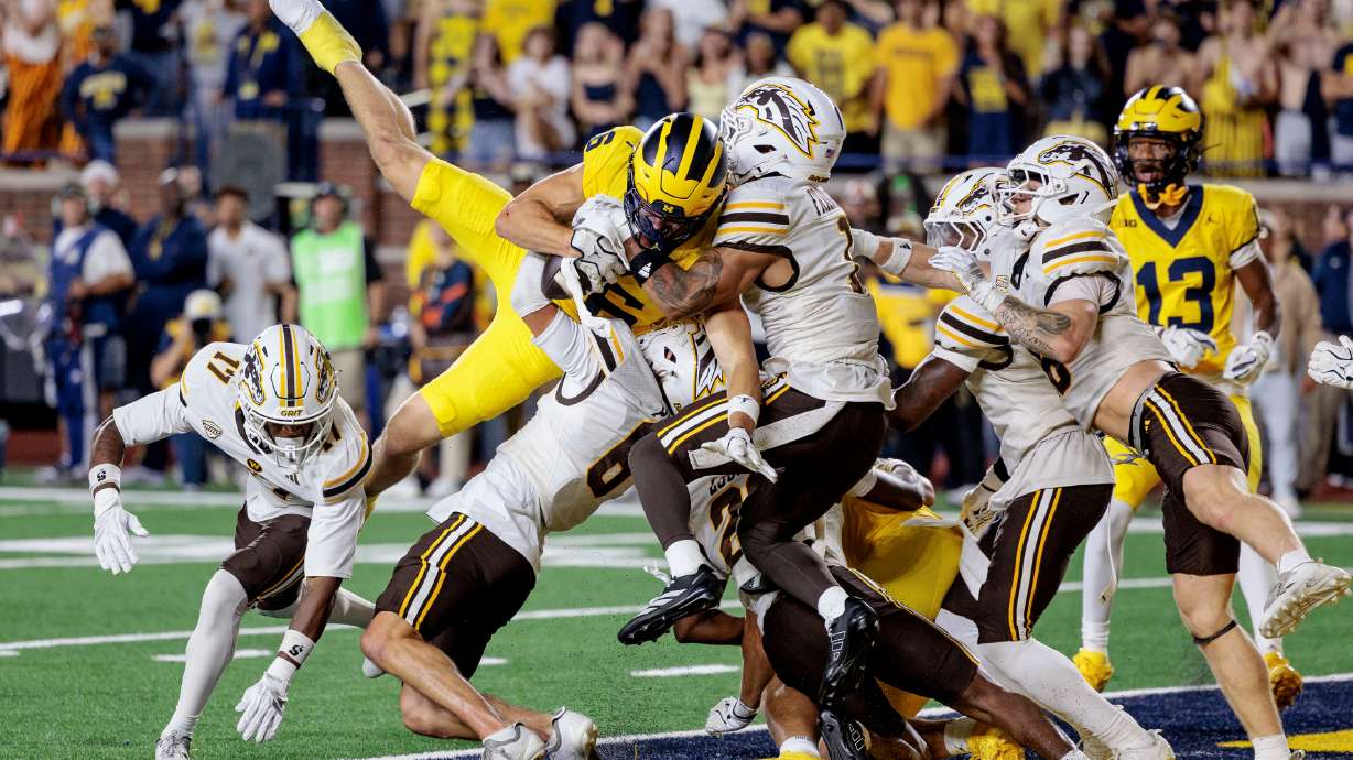 Michigan's wide receiver JJ Buchanan (6) makes the game-winning catch to win over Western Michigan with a last-second touchdown during an NCAA college football game in Ann Arbor, Mich., Saturday, Sept. 5 2026.