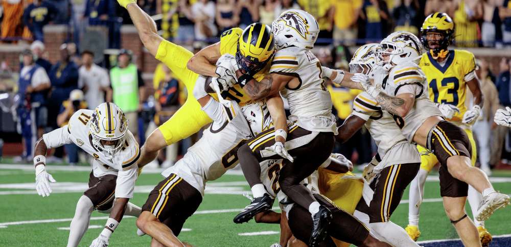 Saturday Night Five: LSU's pause with pros, Boise State stands tall, Michigan's miracle and wipeouts galore