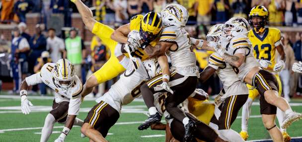 Saturday Night Five: LSU's pause with pros, Boise State stands tall, Michigan's miracle and wipeouts galore