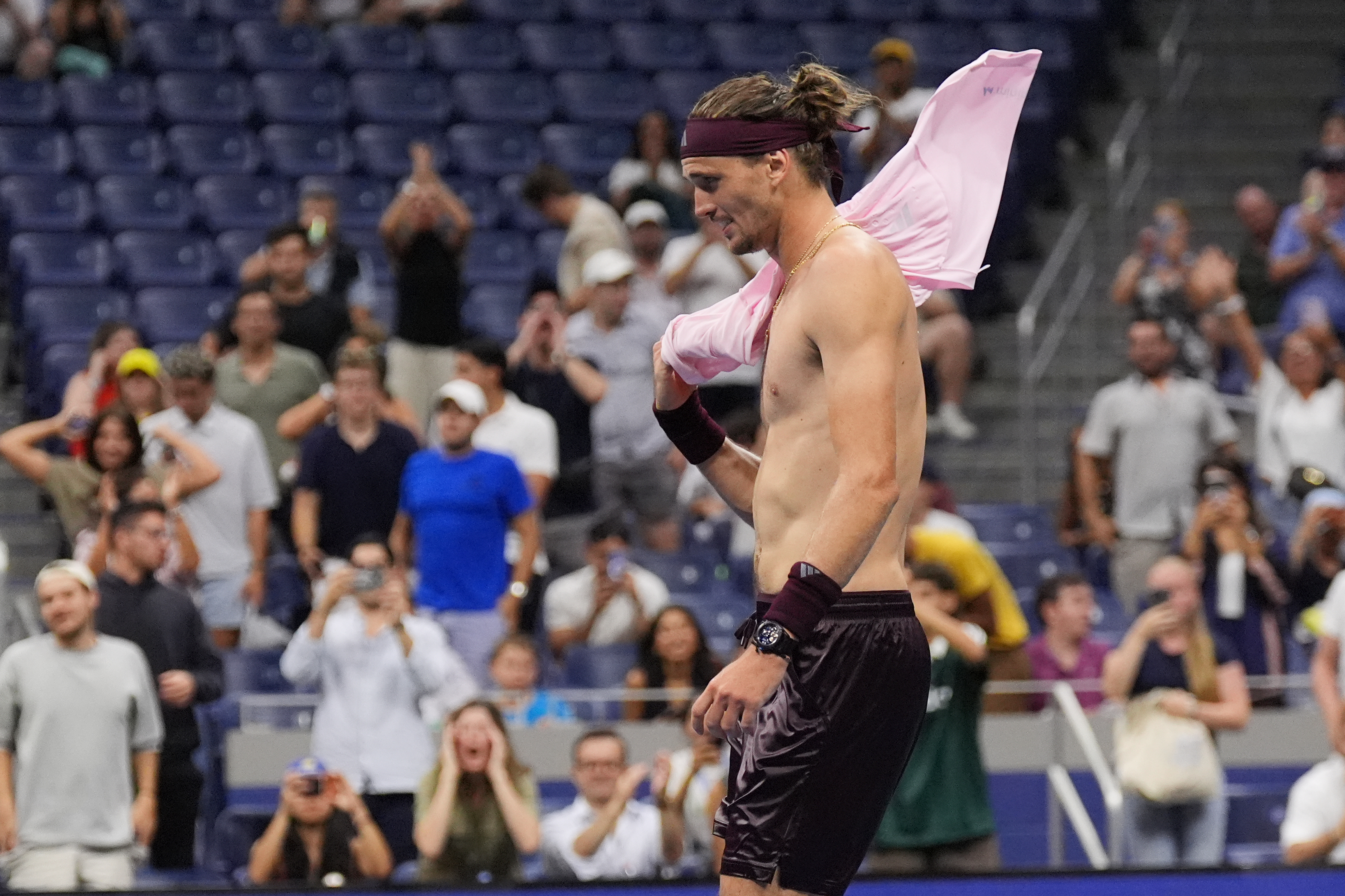 Alexander Zverev, of Germany, celebrates after defeating Quentin Halys, of France, in five sets in the the second round of the U.S. Open tennis championships, early Friday, Sept. 4, 2026, in New York. 