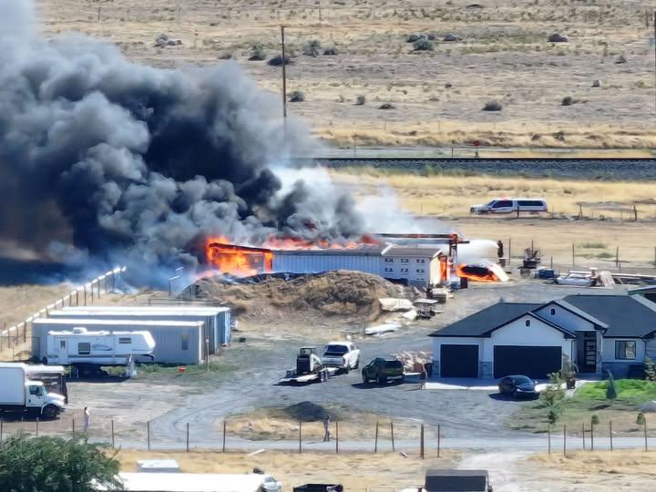 Two sheds that caught fire in Erda, Tooele County, were determined to be a total loss after they both went up in flames on Sunday.