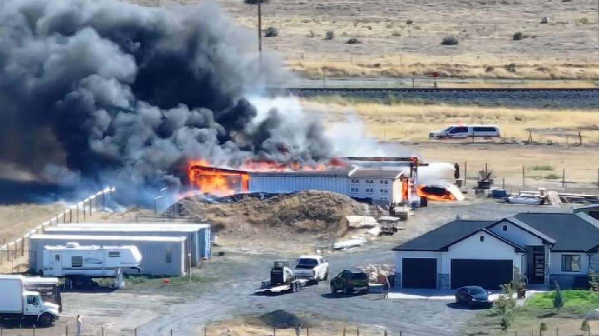 Two sheds that caught fire in Erda, Tooele County, were determined to be a total loss after they both went up in flames on Sunday.