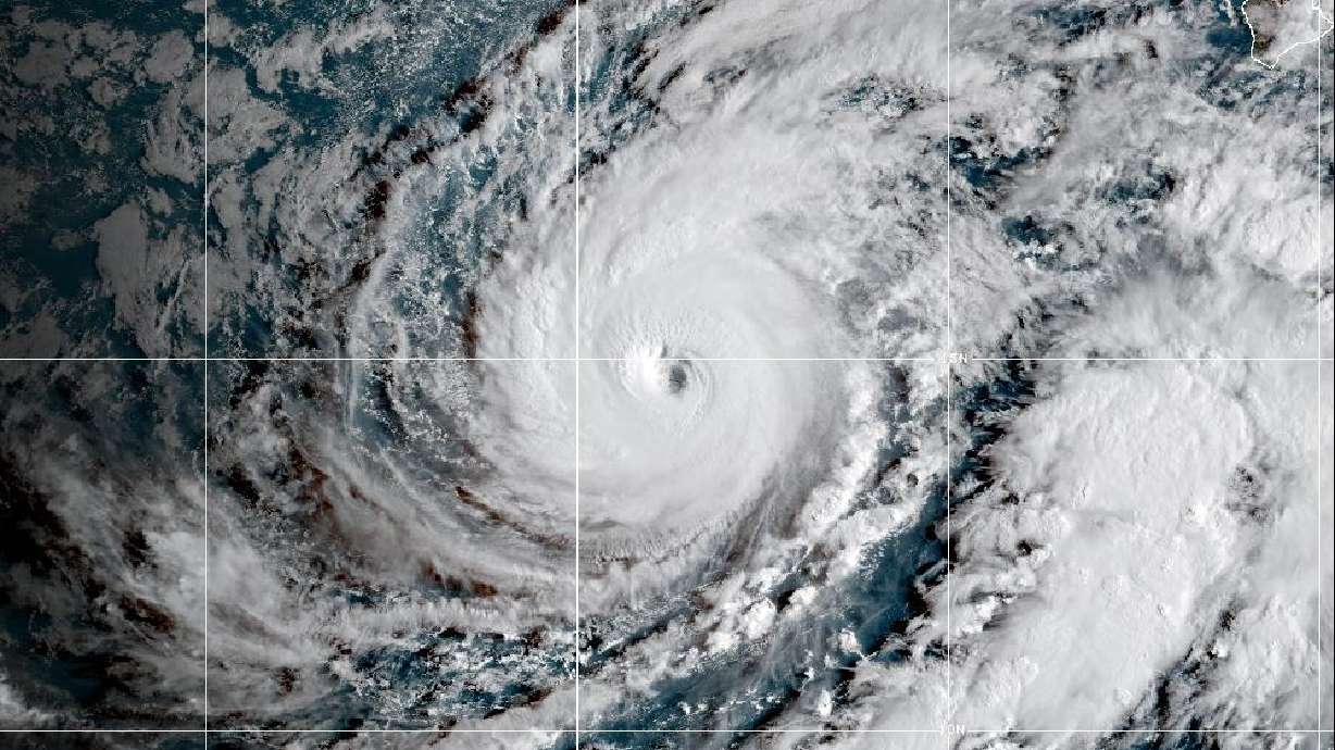 This satellite image released by NOAA shows Hurricane Lowell approaching Hawaii on Sunday.