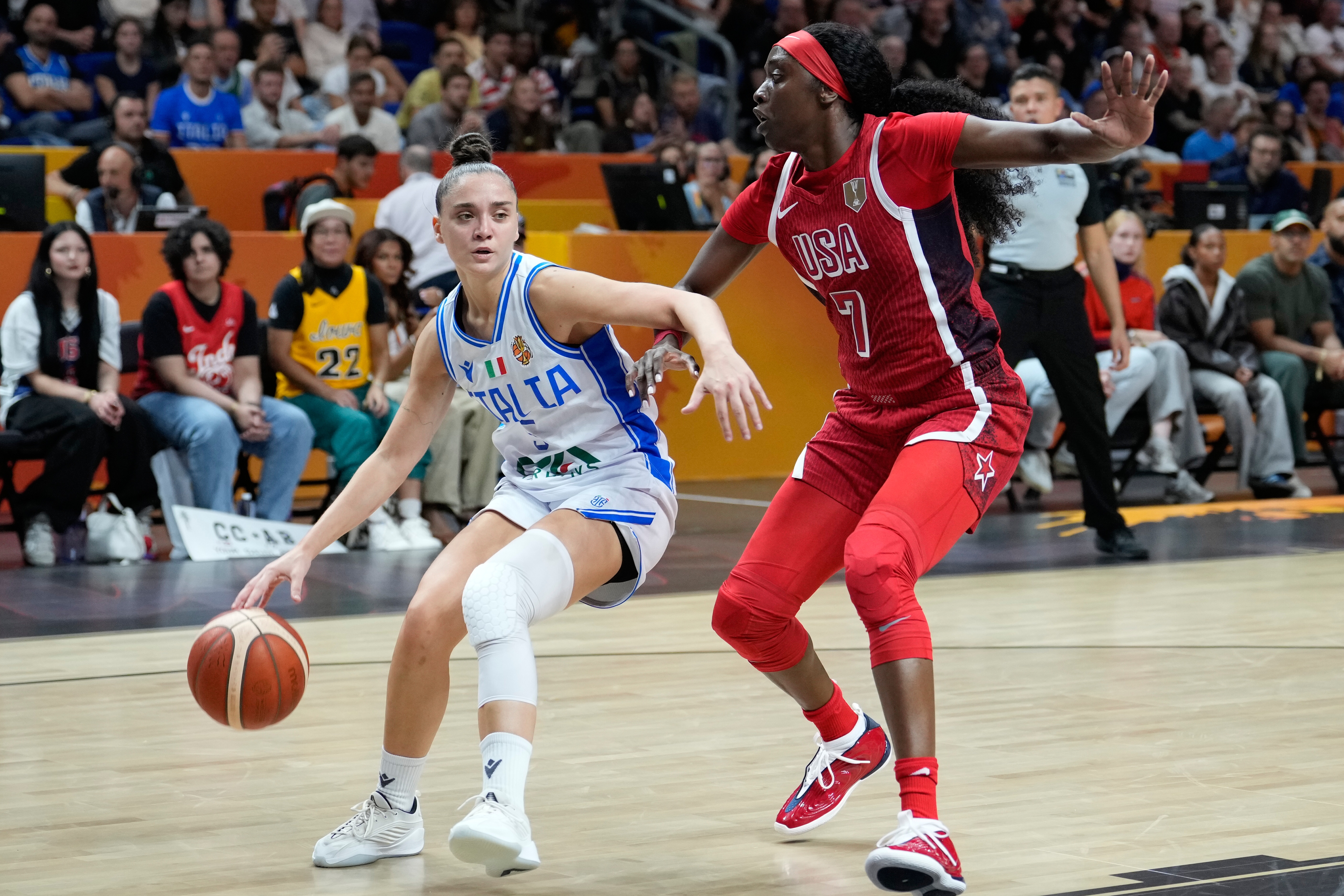 Kahleah Copper, of the United States, guards Italy's Matilde Villa during the Women's Basketball World Cup match between the United States and Italy in Berlin, Sunday, Sept. 6, 2026. 