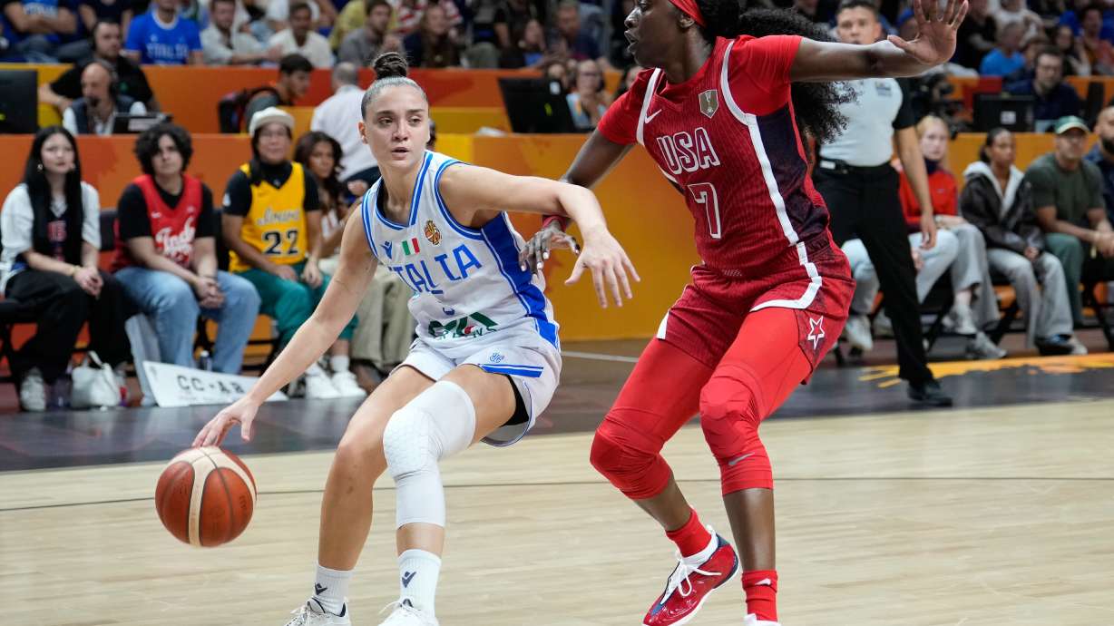 Kahleah Copper, of the United States, guards Italy's Matilde Villa during the Women's Basketball World Cup match between the United States and Italy in Berlin, Sunday, Sept. 6, 2026.