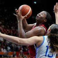 A gritty late surge lifts the US past Italy 55-52 in its toughest World Cup test in years