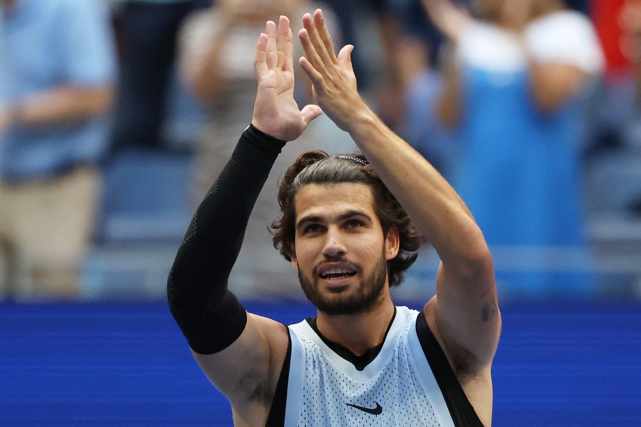 Carlos Alcaraz, of Spain, gestures after he won his match against Tommy Paul, of the United States, during the fourth round of the U.S. Open tennis championships Sunday, Sept. 6, 2026, in New York. 