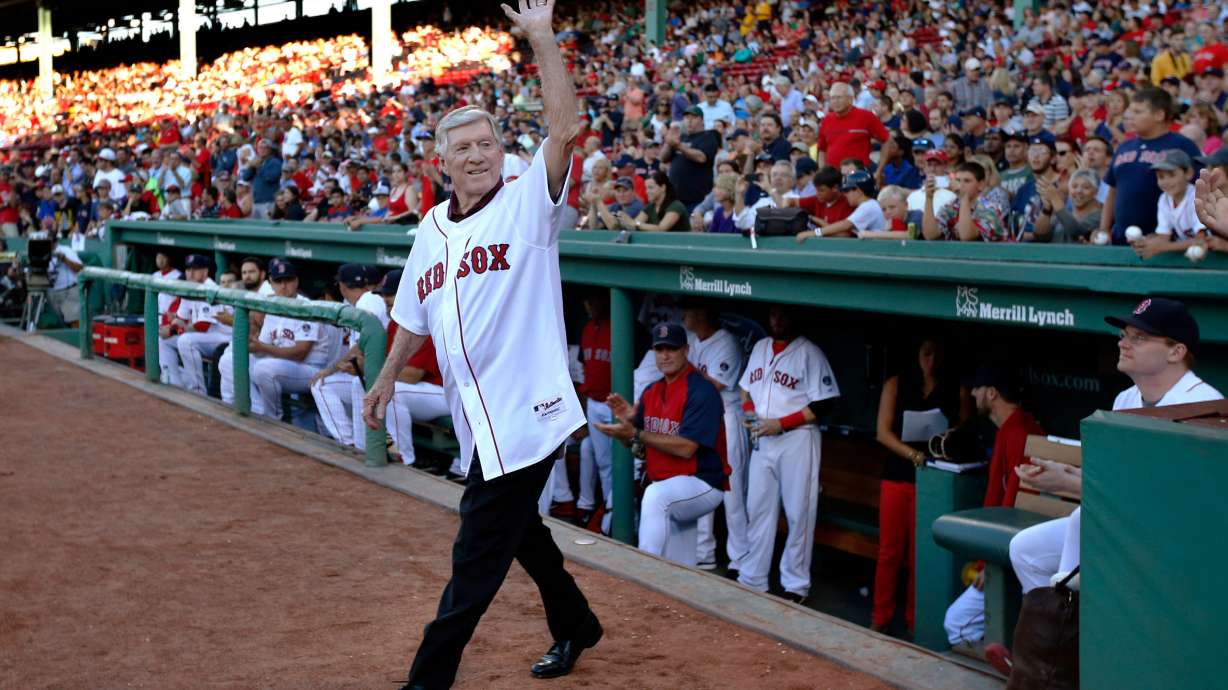 FILE - Former Boston Red Sox manager Joe Morgan waves to fans as he is honored prior to a baseball game between the Red Sox and the Seattle Mariners in Boston on July 30, 2013.