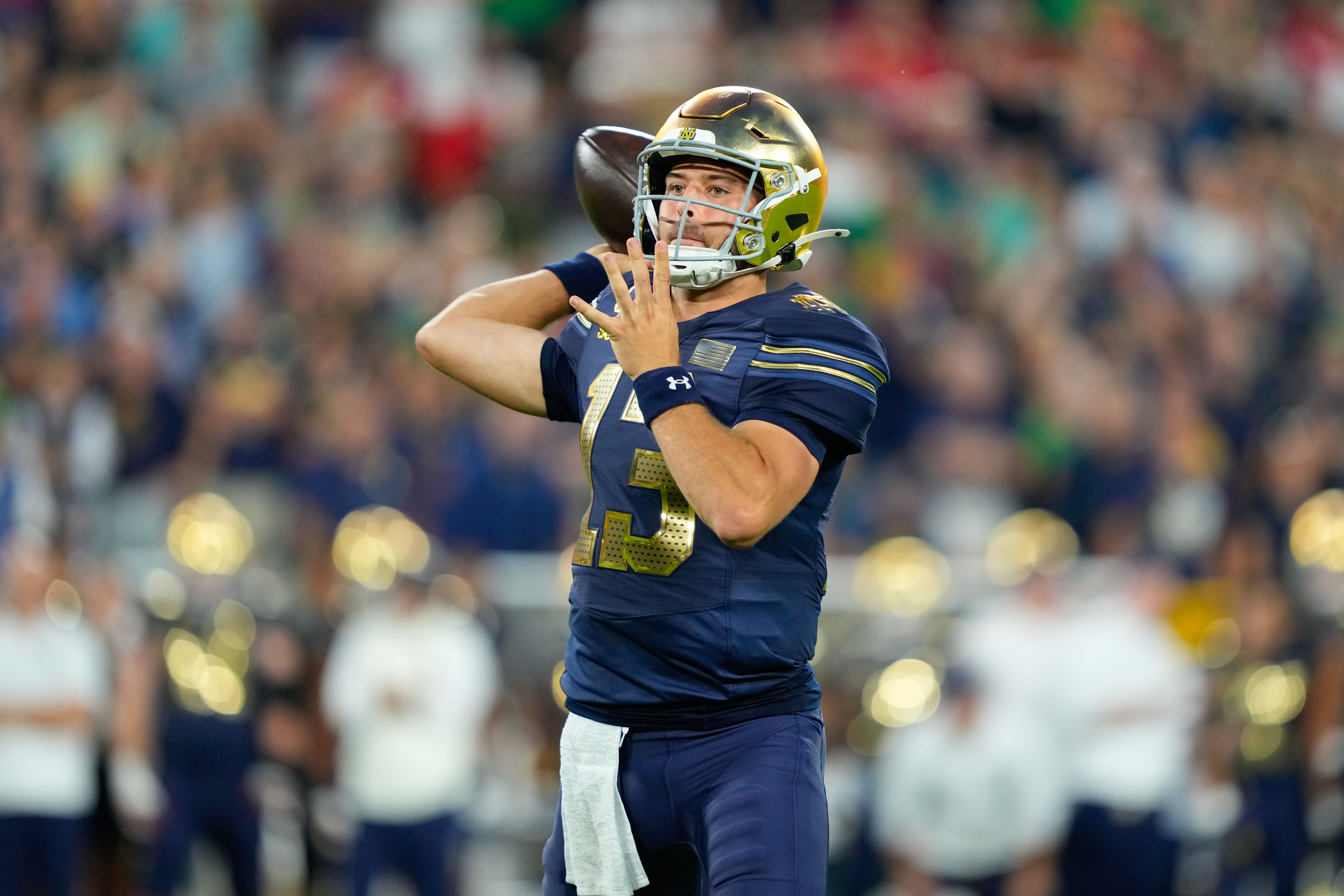 Notre Dame quarterback CJ Carr throws during the first half of an NCAA college football game against Wisconsin Sunday, Sept. 6, 2026, in Green Bay, Wis. 