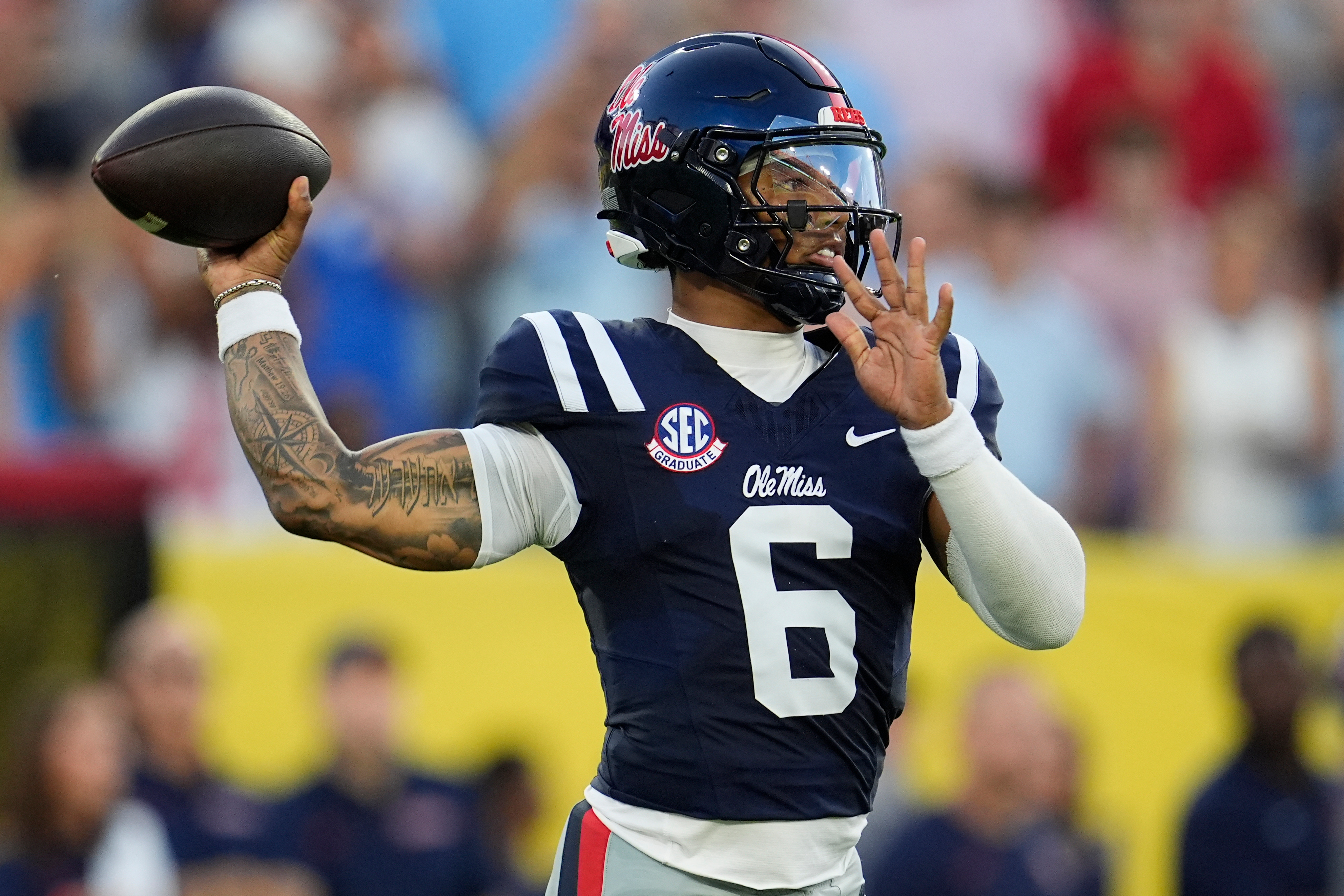 Mississippi quarterback Trinidad Chambliss (6) looks to throw a pass during the first half of an NCAA college football game against Louisville, Sunday, Sept. 6, 2026, in Nashville, Tenn. 
