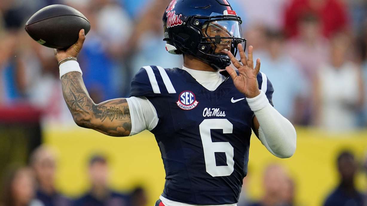 Mississippi quarterback Trinidad Chambliss (6) looks to throw a pass during the first half of an NCAA college football game against Louisville, Sunday, Sept. 6, 2026, in Nashville, Tenn.