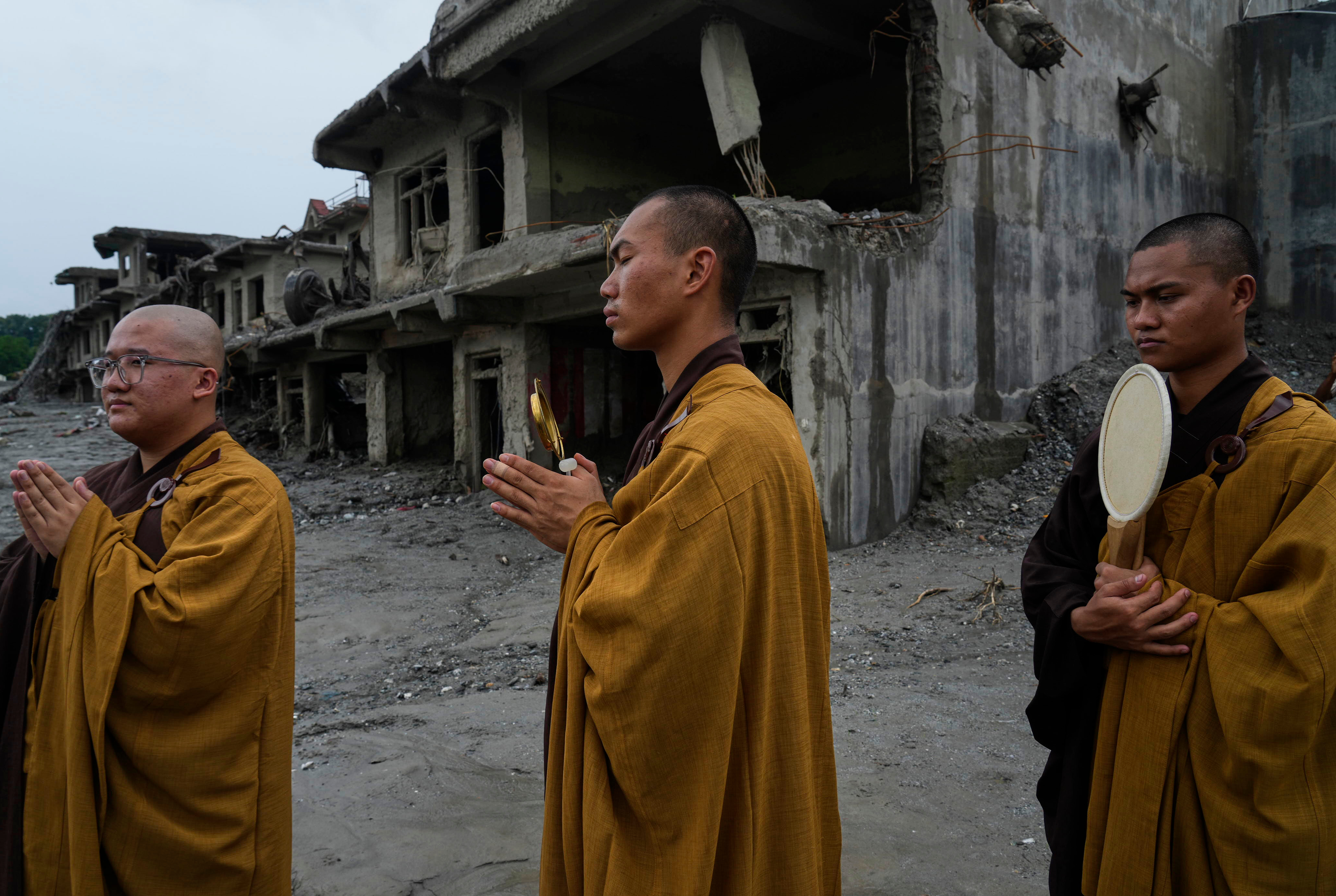 Nepal holds a day of mourning after floods kill at least 1,300 people