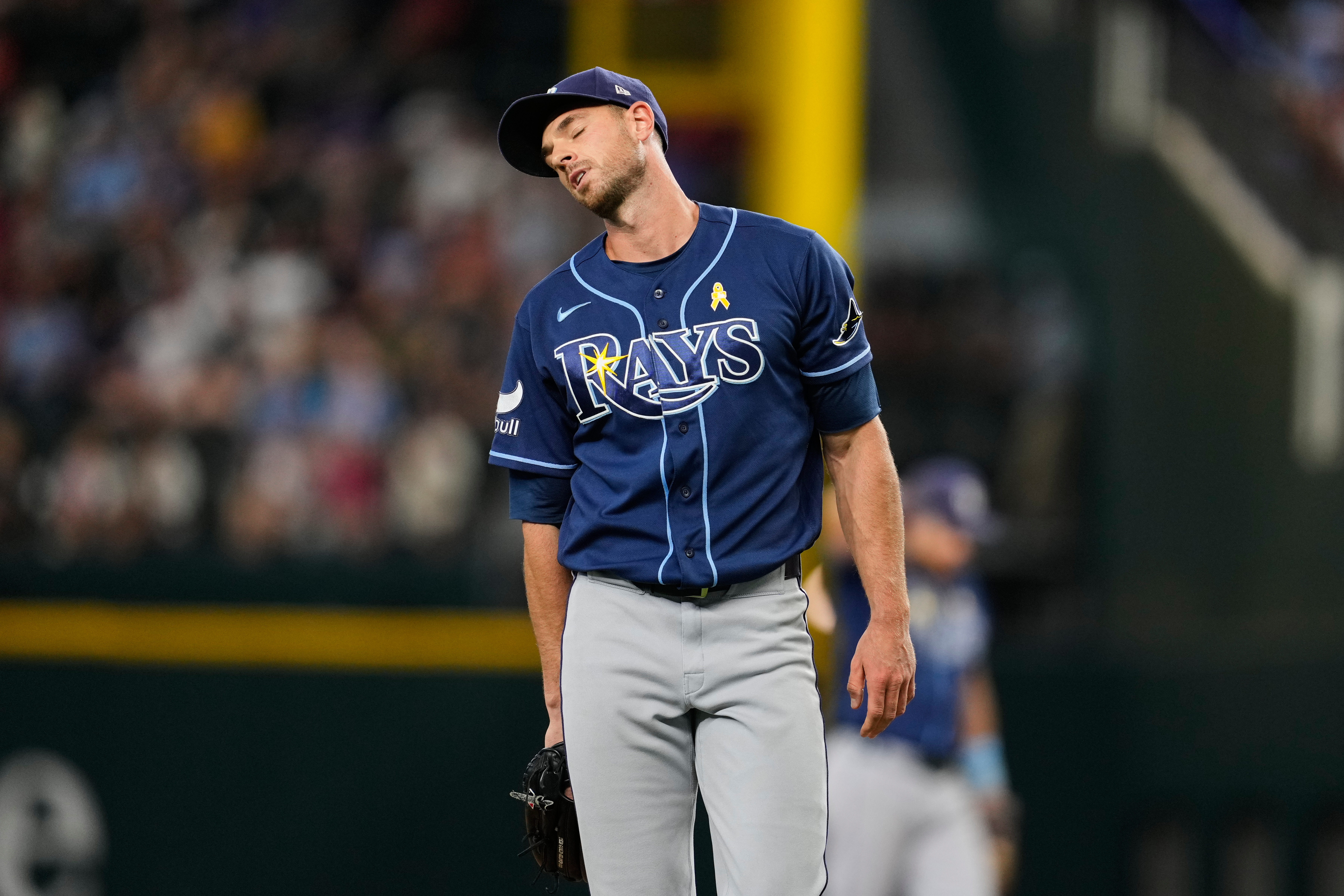 Tampa Bay Rays pitcher Steven Matz turns around on the mound after throwing a pitch to the Texas Rangers during the fifth inning of a baseball game Sunday, Sept. 6, 2026, in Arlington, Texas. 