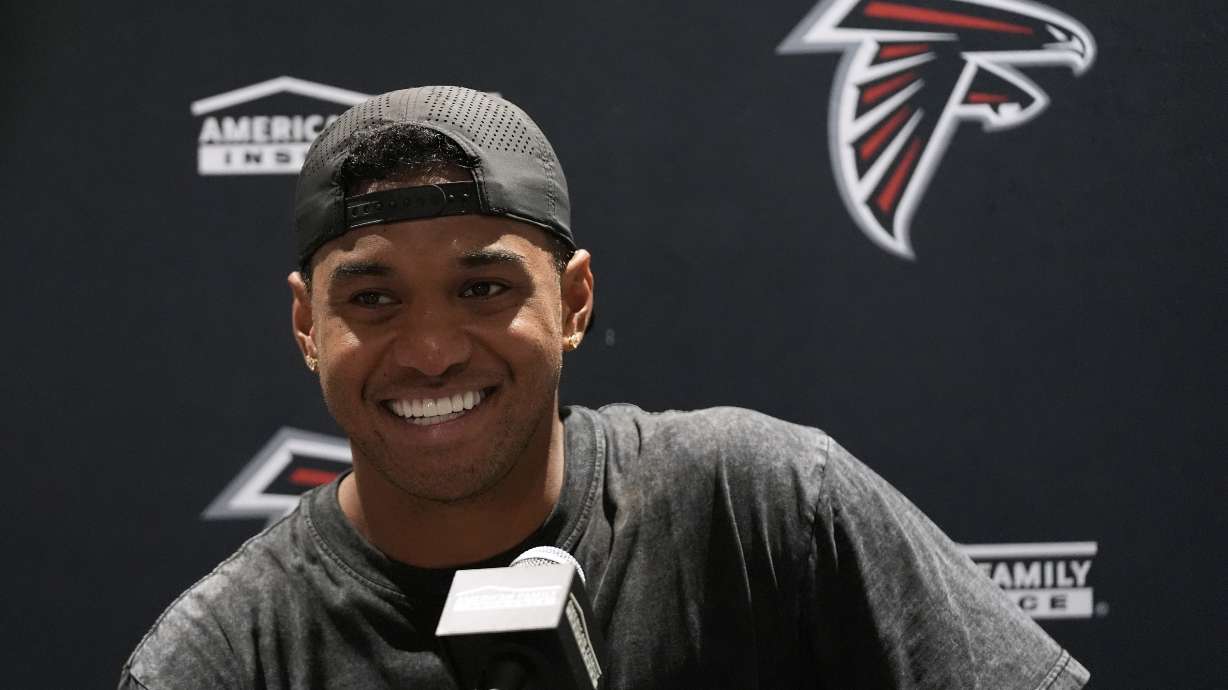 Atlanta Falcons quarterback Tua Tagovailoa speaks at a news conference after an NFL preseason football game against the Miami Dolphins, Friday, Aug. 28, 2026, in Miami Gardens, Fla.