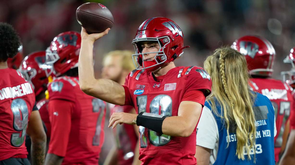 FILE - Wisconsin quarterback Ryan Hopkins (10) throws on the sidelines during the second half of an NCAA college football game against Notre Dame Sunday, Sept. 6, 2026, in Green Bay, Wis.