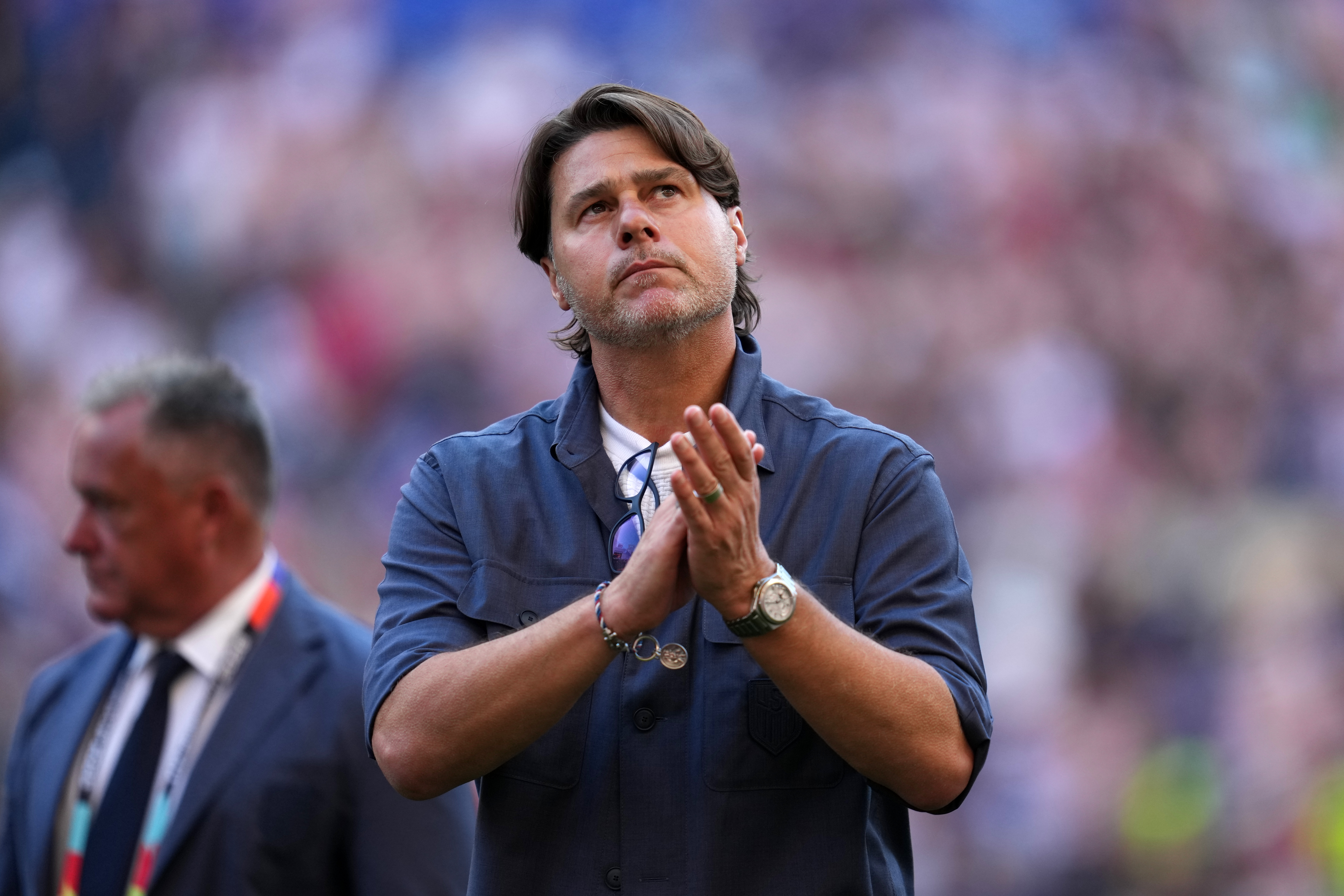 FILE - United States head coach Mauricio Pochettino walks off the field after the United States lost a World Cup round of 16 soccer match against Belgium in Seattle, July 6, 2026. 