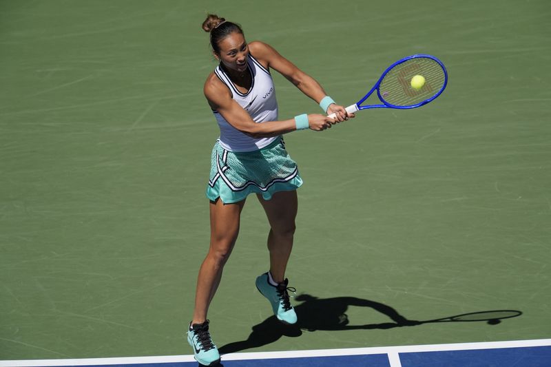 Tennis - U.S. Open - Flushing Meadows, New York, United States - September 7, 2026 China's Qinwen Zheng in action during her round of 16 match against Poland's Iga Swiatek