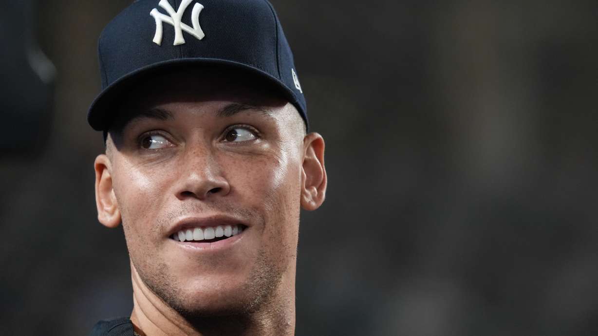 New York Yankees' Aaron Judge smiles towards fans during a baseball game against the Houston Astros, Wednesday, Aug. 26, 2026, in New York.