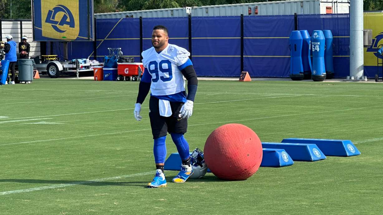 Aaron Donald takes the field for practice at the Los Angeles Rams' training complex in Los Angeles, Sunday, Aug. 30, 2026.