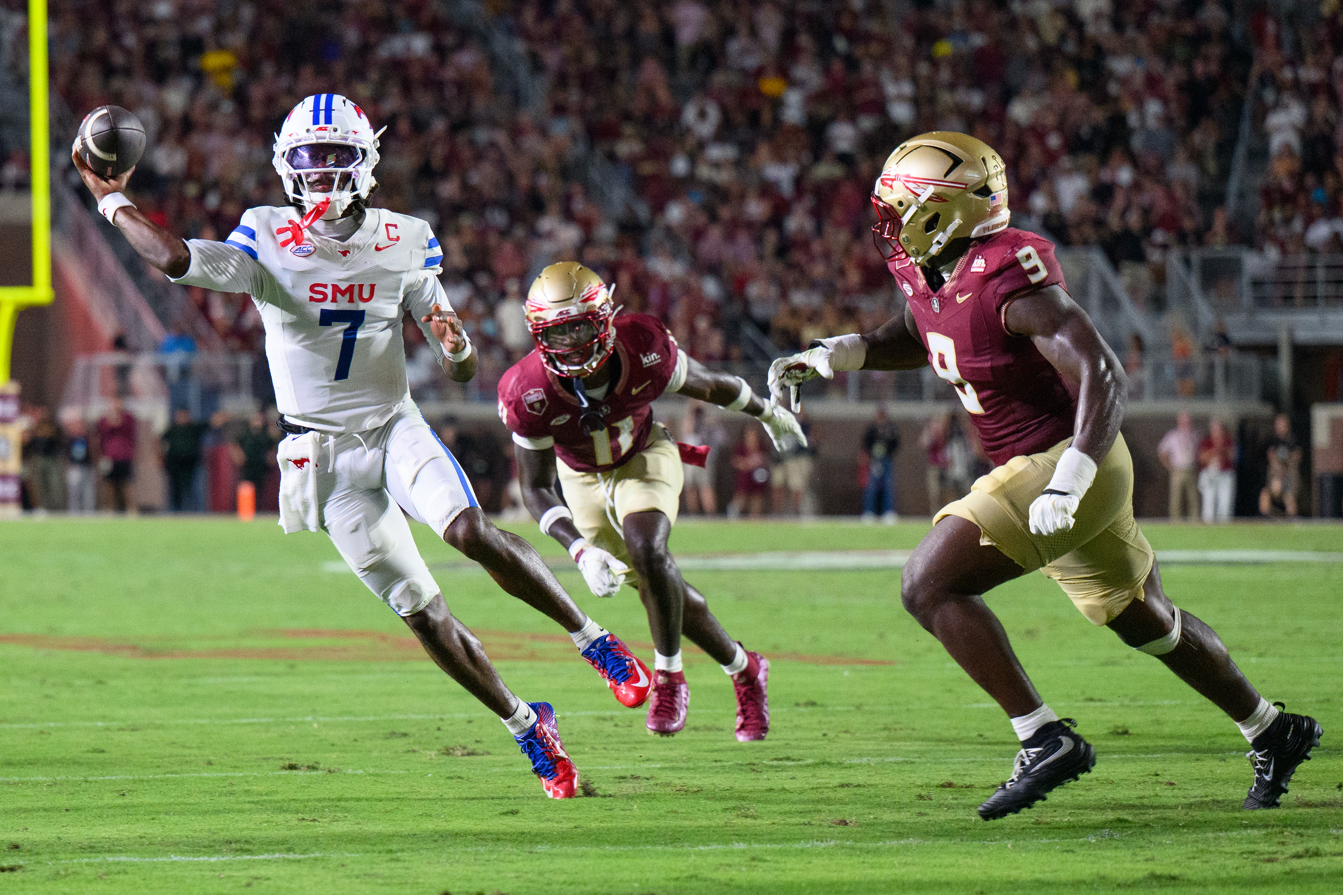 SMU quarterback Kevin Jennings (7) looks to throw during the first half of an NCAA college football game against Florida State, Monday, Sept. 7, 2026, in Tallahassee, Fla. 