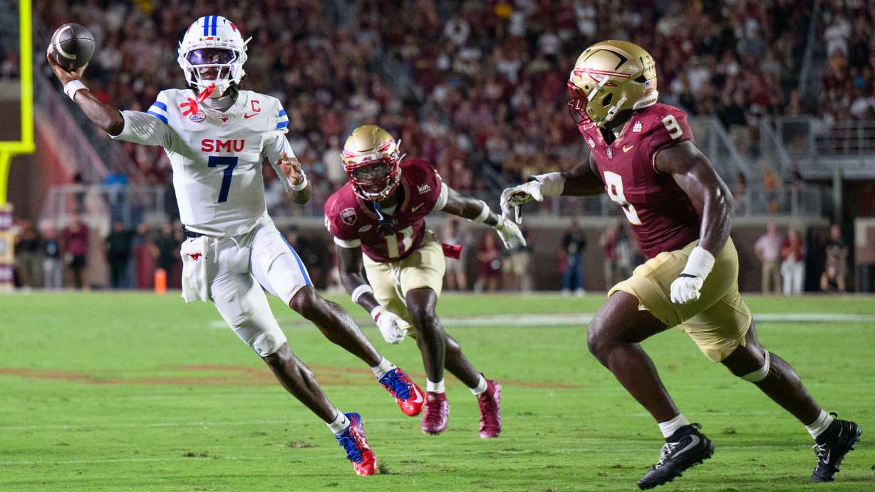 SMU quarterback Kevin Jennings (7) looks to throw during the first half of an NCAA college football game against Florida State, Monday, Sept. 7, 2026, in Tallahassee, Fla.