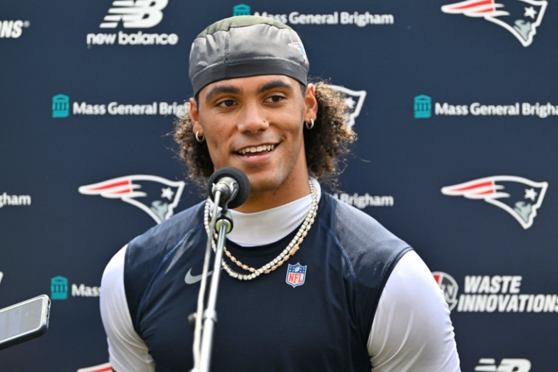 Jul 28, 2026; Foxborough, MA, USA; New England Patriots cornerback Christian Gonzalez (0) speaks to the media after practice at training camp at Gillette Stadium.