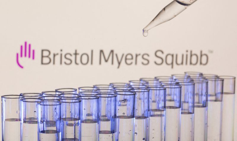 FILE PHOTO: Test tubes are seen in front of a displayed Bristol Myers Squibb logo in this illustration taken, May 21, 2021.