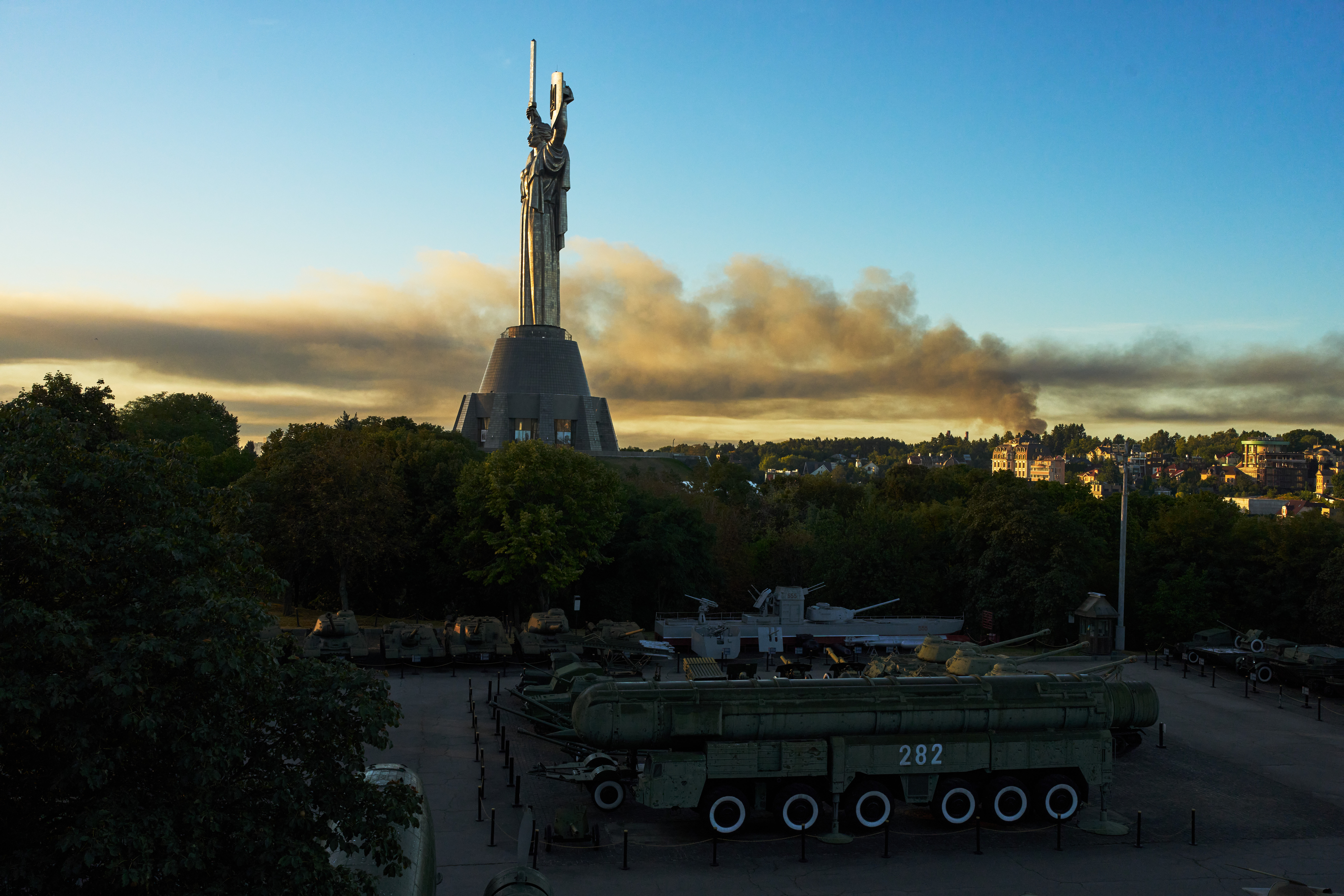Smoke rises following a Russian missiles attack in Kyiv, Ukraine, early Tuesday. Ukraine's top diplomat said the continued attacks are harming peace efforts.