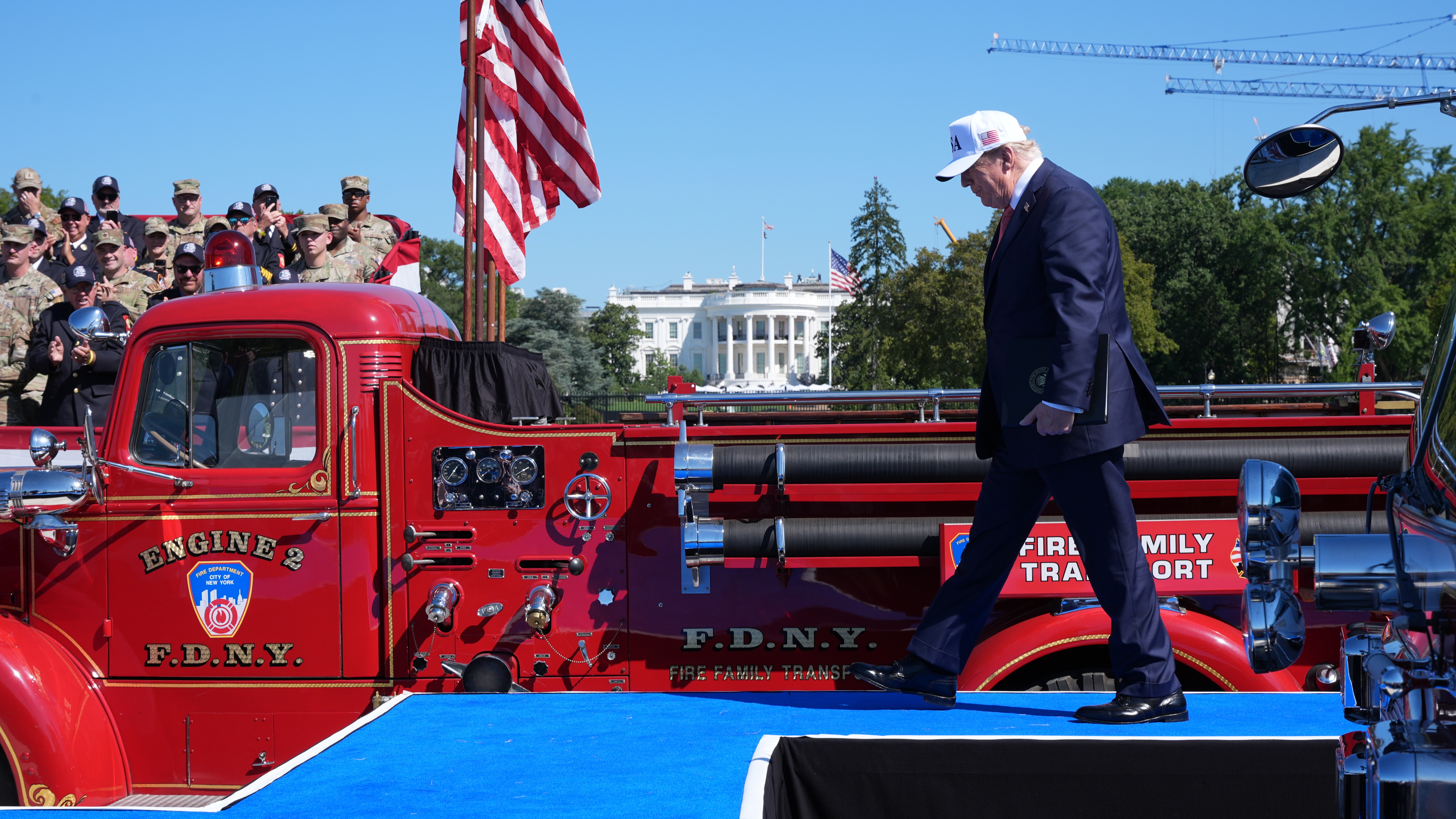 President Donald Trump arrives to speak during the Tunnel to Towers Foundation event for the 25th anniversary of 9/11, on the Ellipse near the White House in Washington, Tuesday. Trump pledged to "never forget" the victims of the attacks.