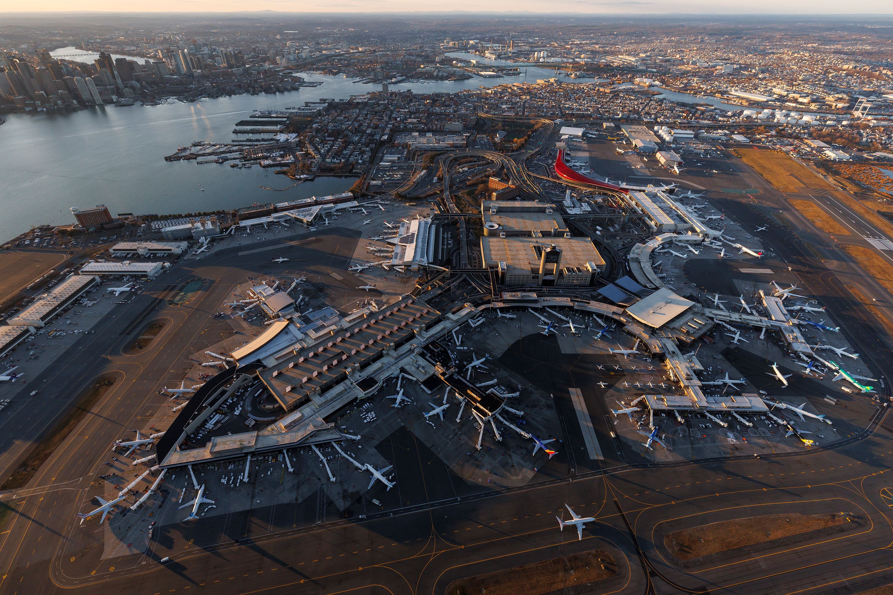 An aerial view shows the entirety of Boston Logan International Airport in December 2025.