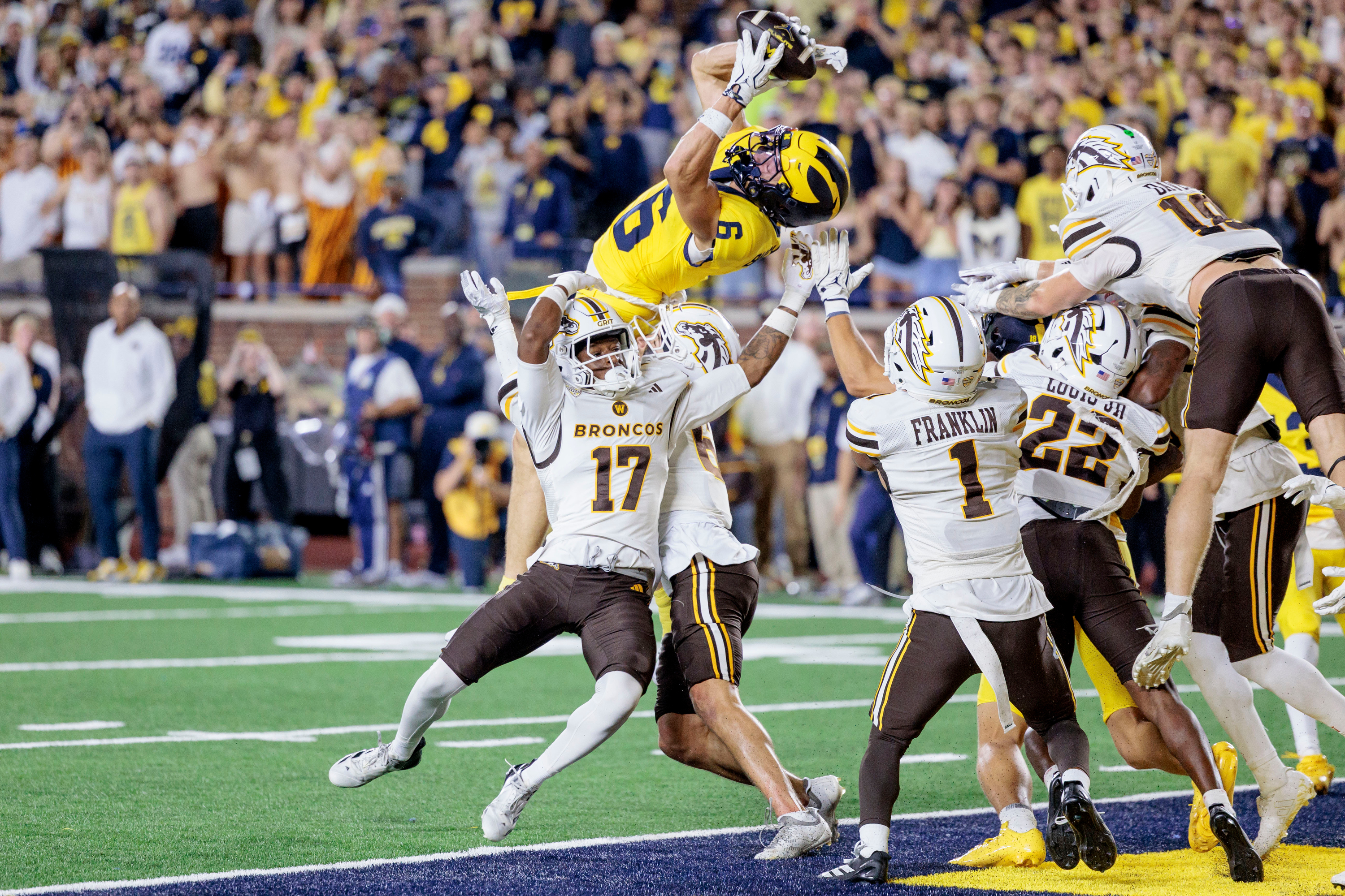 Michigan's wide receiver JJ Buchanan (6) makes the game-winning catch to win over Western Michigan with a last-second touchdown during an NCAA college football game in Ann Arbor, Mich., Saturday, Sept. 5 2026. 