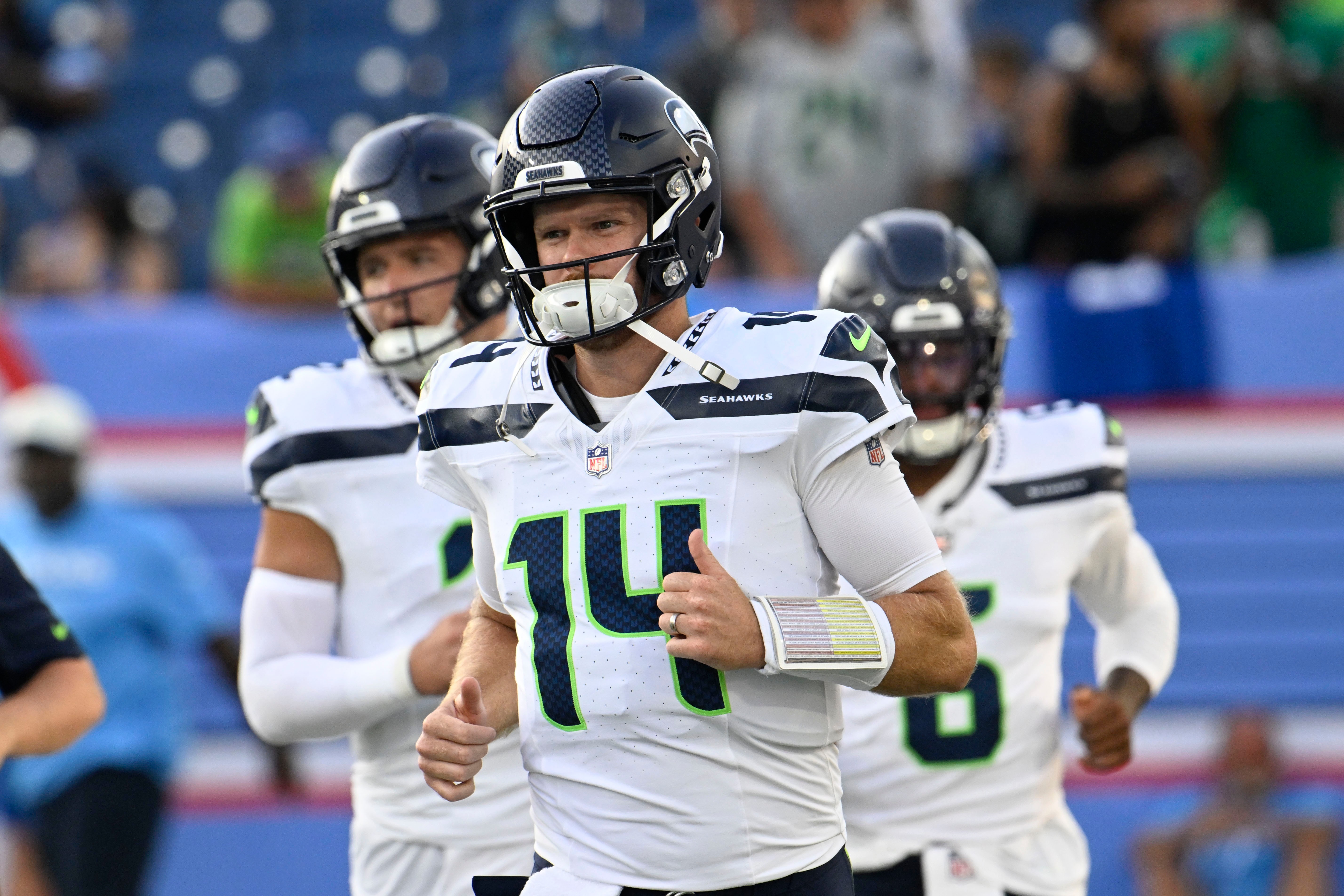 Seattle Seahawks quarterback Sam Darnold (14) warms up before a preseason NFL football game against the Tennessee Titans, Sunday, Aug. 23, 2026, in Nashville, Tenn. 