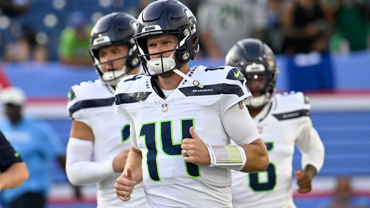Seattle Seahawks quarterback Sam Darnold (14) warms up before a preseason NFL football game against the Tennessee Titans, Sunday, Aug. 23, 2026, in Nashville, Tenn.