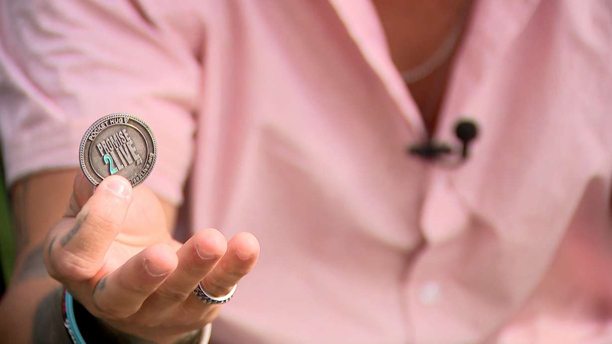 Jordan Starks carries a "Promise to Live" coin with him in his wallet.
