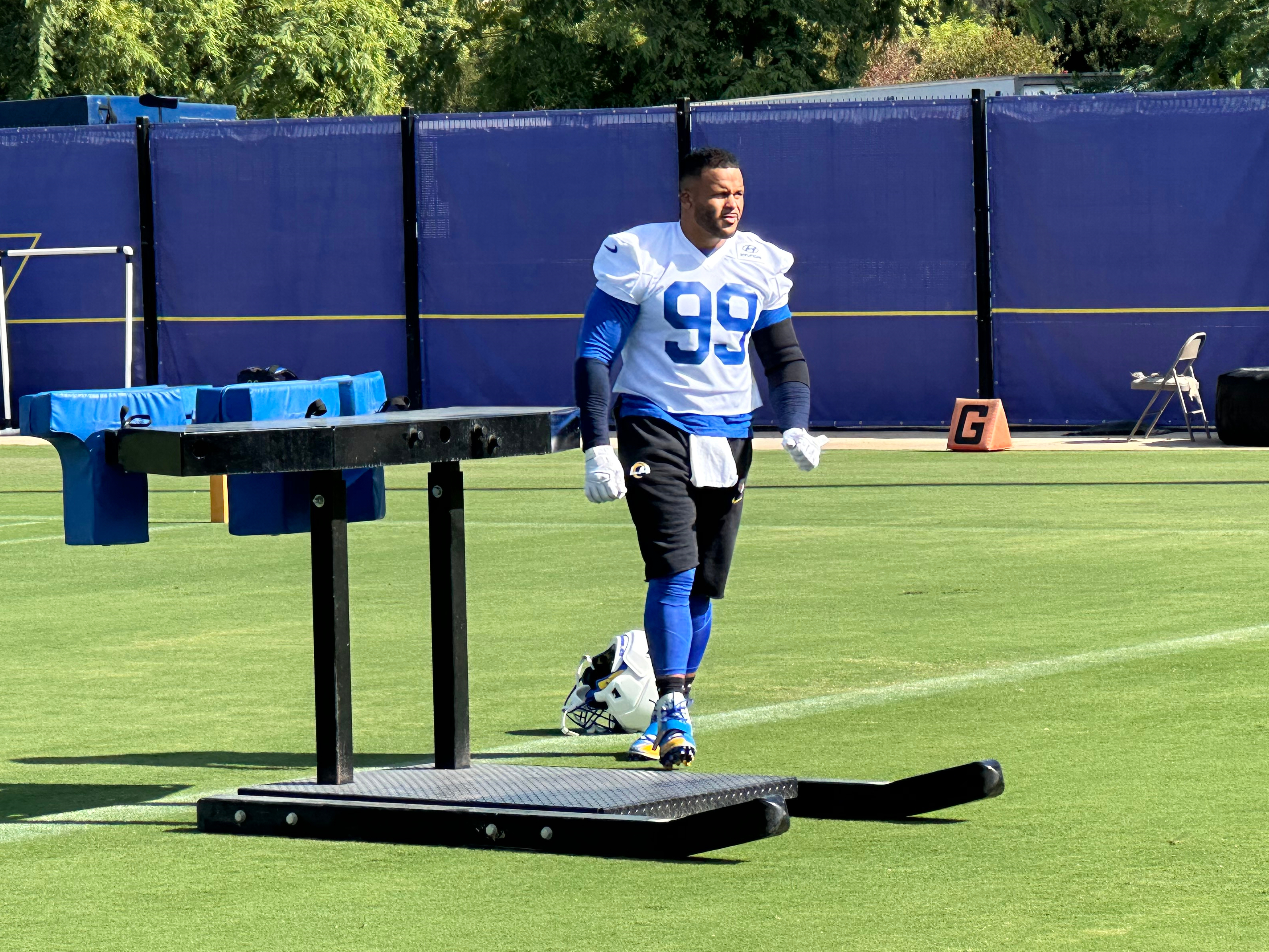 Aaron Donald takes the field for practice at the Los Angeles Rams' training complex in Los Angeles, Sunday, Aug. 30, 2026. 
