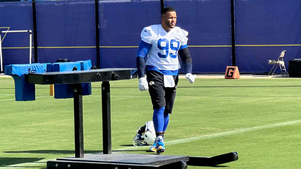 Aaron Donald takes the field for practice at the Los Angeles Rams' training complex in Los Angeles, Sunday, Aug. 30, 2026.