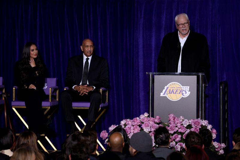 Feb 8, 2024; Los Angeles, CA, USA; Former Los Angeles Lakers head coach Phil Jackson speaks during a ceremony for the unveiling of a statue for former Los Angeles Lakers guard Kobe Bryant at Star Plaza outside of Crypto.com Arena. Joining him on stage are Vanessa Bryant and Stu Lantz.